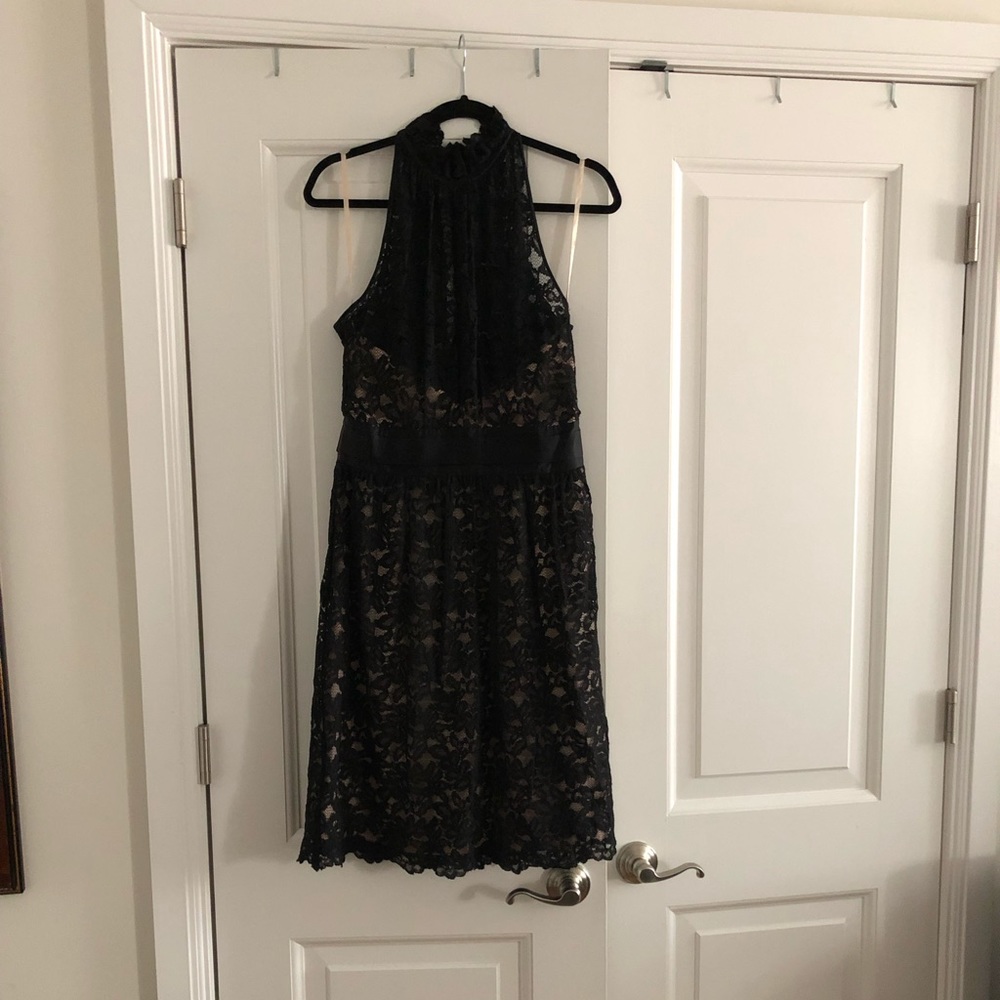 Black lace sleeveless cocktail dress
